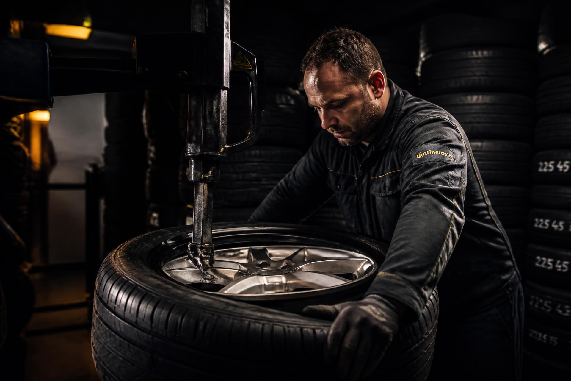 Technician installing new tires at Discount Tire and Auto Repair LLC in Tallahassee